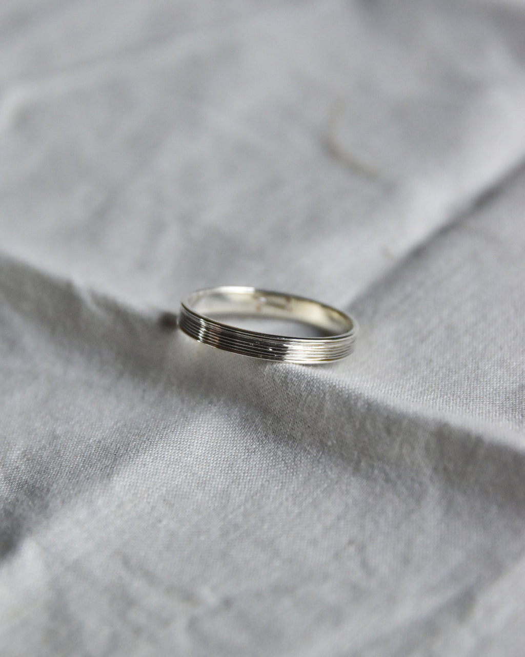 DAN TOMIMATSU | Spool Ring Short Half Wind -SL925 / PT900